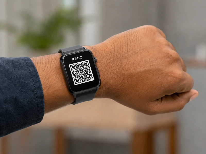 Apple Watch showing KADO digital business card QR code ready to share